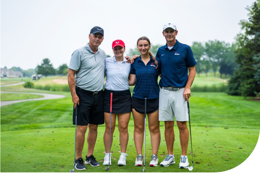four golfers posing at the Cardinal Legacy Golf Outing